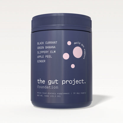 Navy blue container labeled 'foundation by the gut project' on a white background